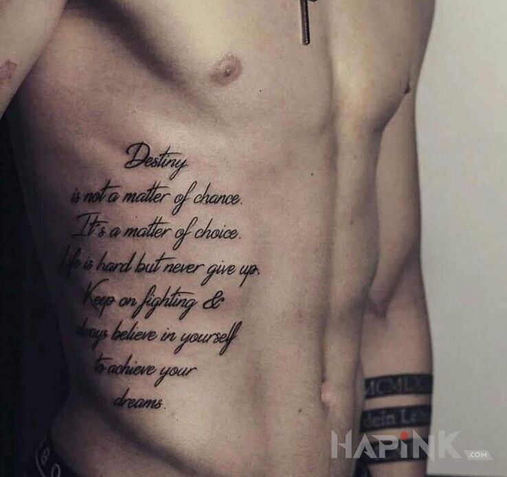 Tattoo Kilka porad po angielsku in lettering motif and calligraphy style on the ribs