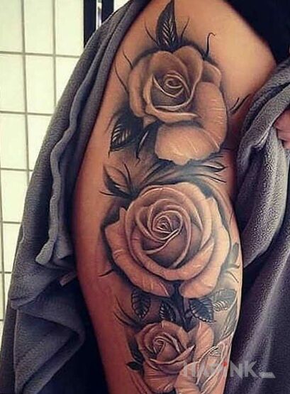 Tattoo Pieknoo in flowers motif and realistic style on the leg