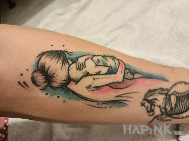 Tattoo Matczyna miłość in colorful motif and graphic / illustrative style on the forearm