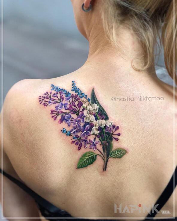 Tattoo Gałązka bzu z konwalią in nature motif and realistic style on the back
