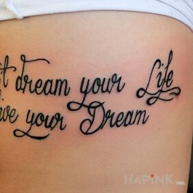 Tattoo A very apt phrase on the ribs motif: lettering