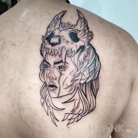 Tattoo Shamaness on the back motif: skulls style: contour / linework