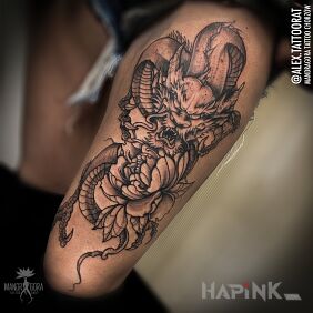 Tattoo Japanese dragon on the leg motif: fantasy style: graphic / illustrative