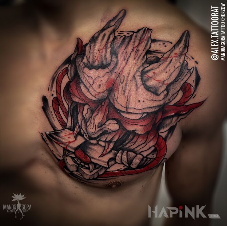 Tattoo Oni mask in black and gray motif and graphic / illustrative style on the chest