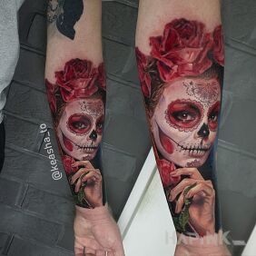 Tattoo Muerte on the forearm motif: santa muerte style: realistic
