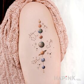 Tattoo Solar system and star constellations on the upper arm motif: cosmos style: realistic