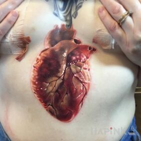 Tattoo Realistic heart on the chest style: realistic