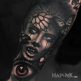 Tattoo Upside down eyes on the forearm motif: faces style: realistic