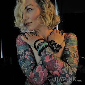 Tattoo Japanese tattoos on an elderly woman on the upper arm motif: sleeves style: japanese / irezumi