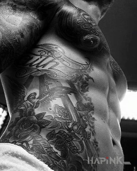 Tattoo Mrr ale brzuszek in religious motif on the stomach