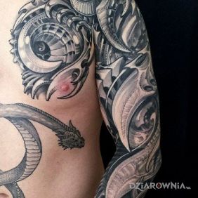 Tatuaż Organic sleeve byku na przedramieniu motyw: smoki styl: organika