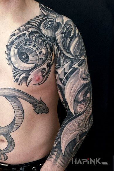 Tattoo Organic sleeve byku in black and gray motif and organic style on the chest