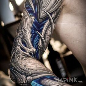Tattoo Blue Glow on the upper arm motif: sleeves style: organic