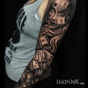 Tattoo Money in the casino on the forearm motif: sleeves style: realistic