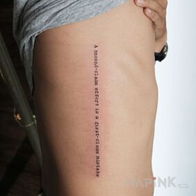 Tattoo Effort on the ribs motif: lettering style: calligraphy