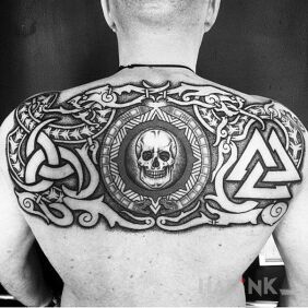 Tattoo Celtic symbols on the back motif: black and gray style: graphic / illustrative