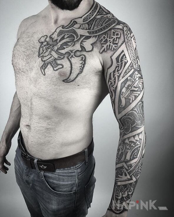 Tattoo Pożarcie przez smoka in sleeves motif and Celtic / Nordic style on the forearm
