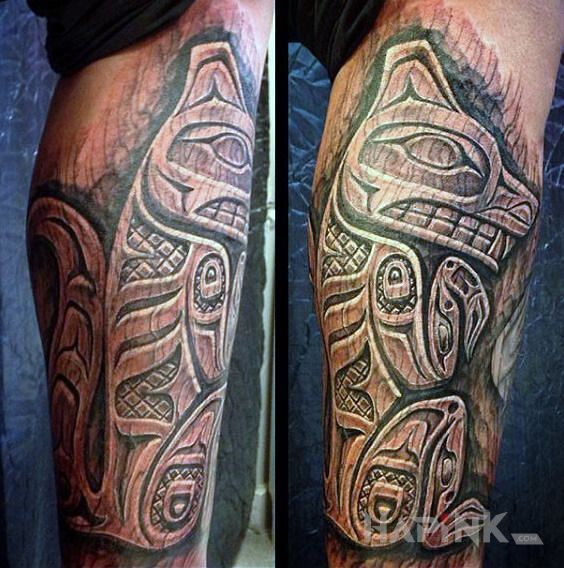 Tattoo Wiewiórka in animals motif and carved wood style on the calf
