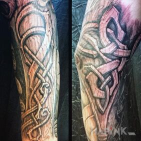 Tattoo Carved wood on the forearm motif: black and gray style: carved wood