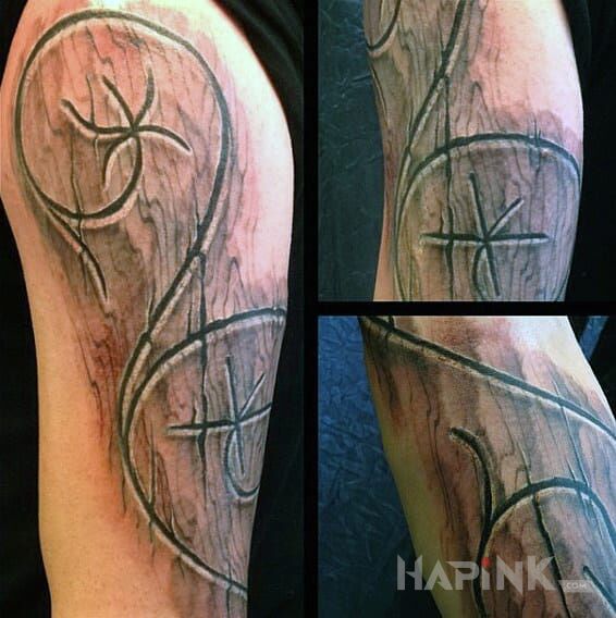 Tattoo Wzór wyryty w desce ? in other motif and carved wood style on the upper arm