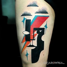 Tatuaż Błyskawica na ramieniu motyw: twarze styl: modern / kubizm
