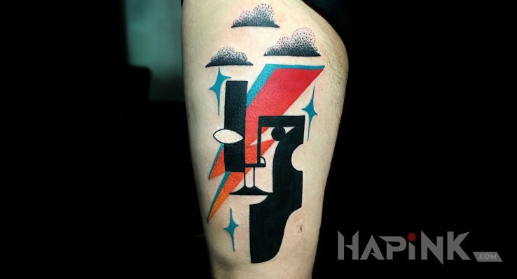 Tattoo Błyskawica in colorful motif and modern / cubism style on the upper arm