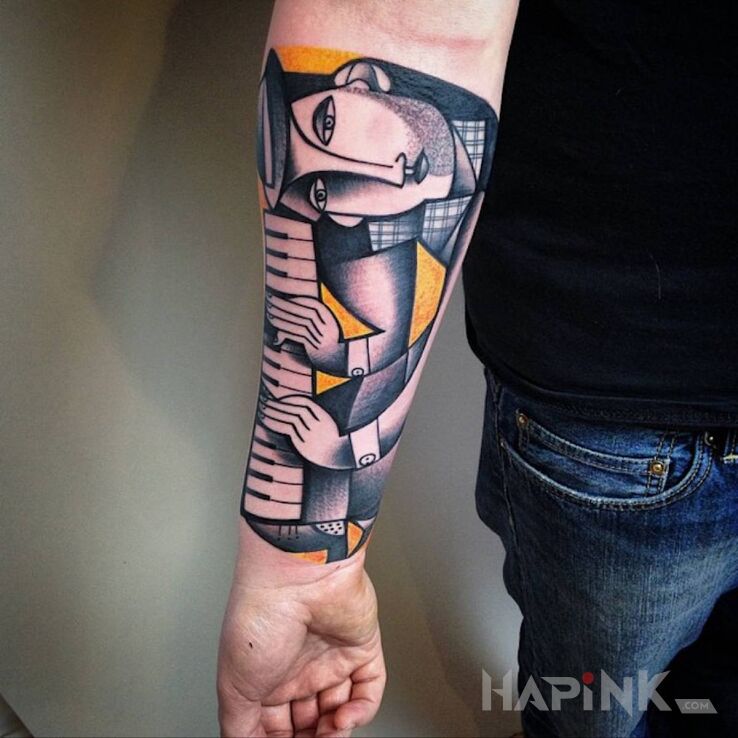 Tattoo Organista in black and gray motif and modern / cubism style on the forearm