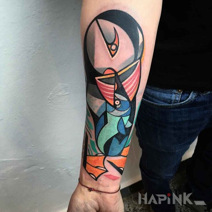 Tattoo Tukan in animals motif and modern / cubism style on the forearm