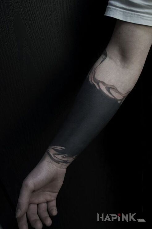 Tattoo Morze czarne in other motif and blackwork / blackout style on the forearm