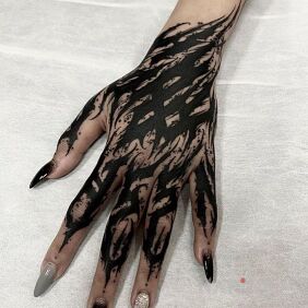 Tattoo Sharp on the hand motif: other style: blackwork / blackout