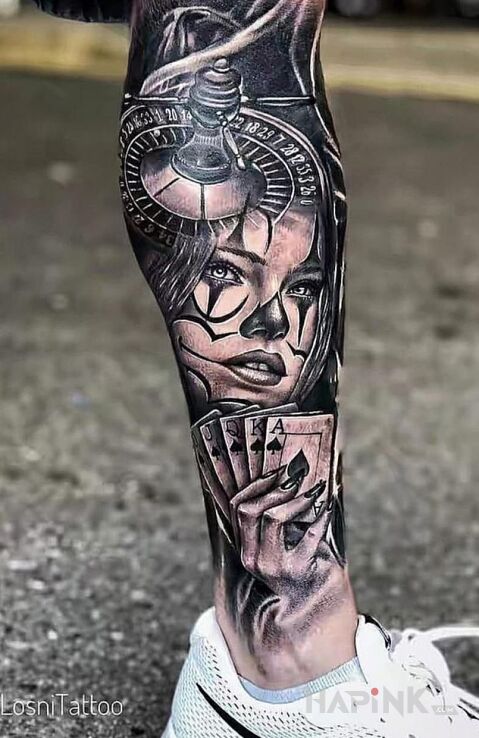 Tattoo Ruletka i poker in faces motif and chicano style on the calf