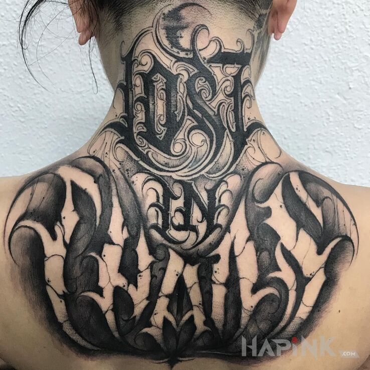 Tattoo Lost in chaos in criminal lettering motif and calligraphy style on the back
