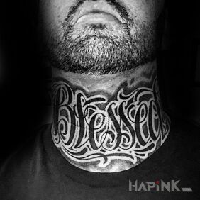 Tattoo Blessed on the throat motif: lettering style: calligraphy