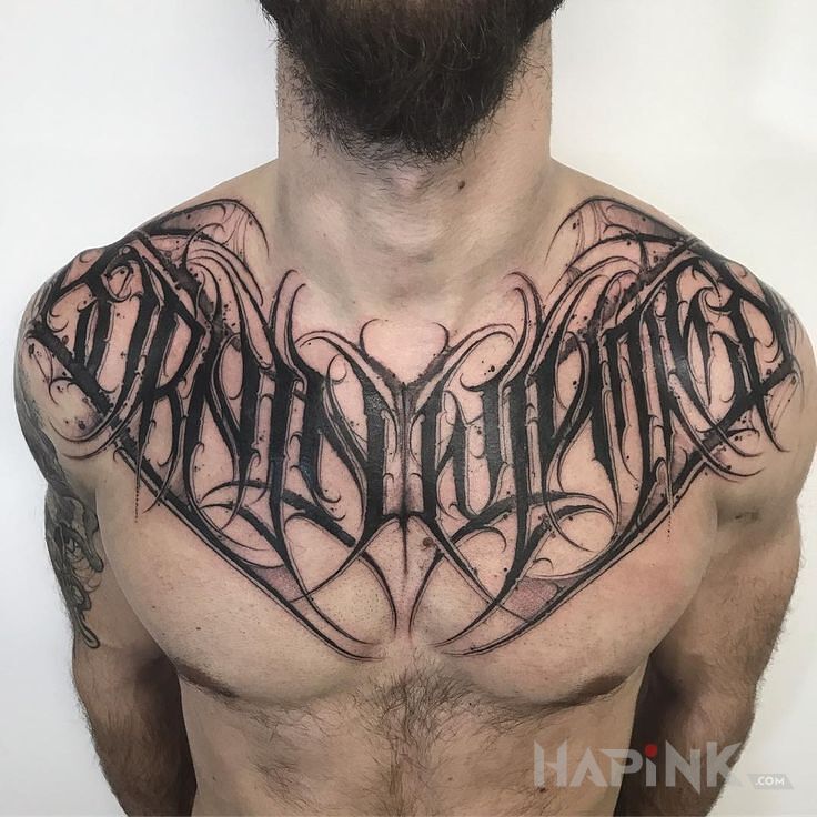 Tattoo Born in winter in lettering motif and calligraphy style on the chest