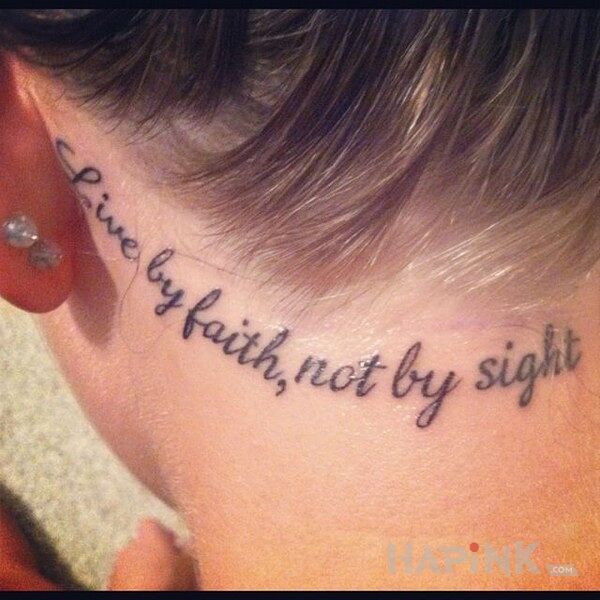 Tattoo Napis za uchem in lettering motif on the nape