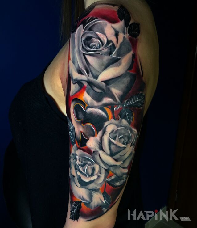Tattoo Rose in 3D motif and realistic style on the upper arm