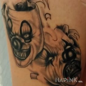 Tattoo Masks on the upper arm motif: demons style: graphic / illustrative