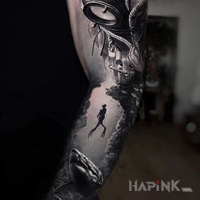 Tattoo Diver on the upper arm motif: animals style: realistic