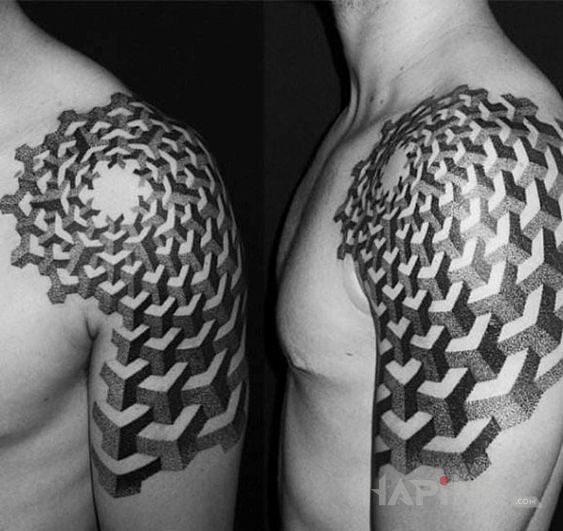 Tattoo Klocki in black and gray motif and dotwork style on the upper arm