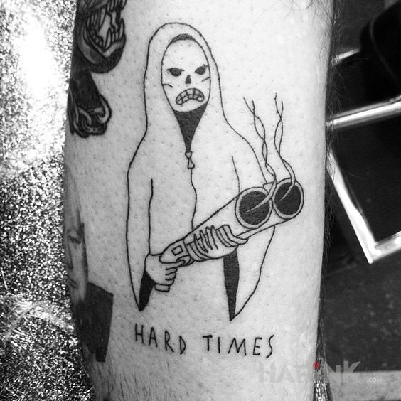 Tattoo Ciężkie czasy in characters motif and ignorant style on the forearm