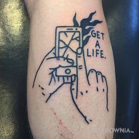 Tatuaż Get a life. na łydce motyw: napisy styl: ignorant
