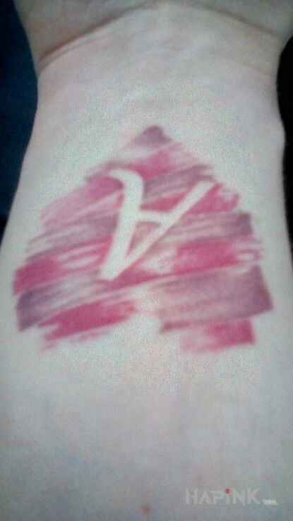 Tattoo Serce in colorful motif on the wrist
