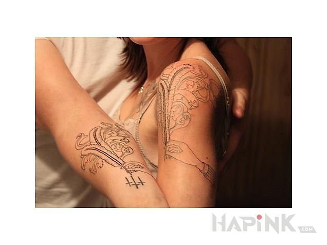 Tattoo Tatuaż dla pary in Love motif on the forearm