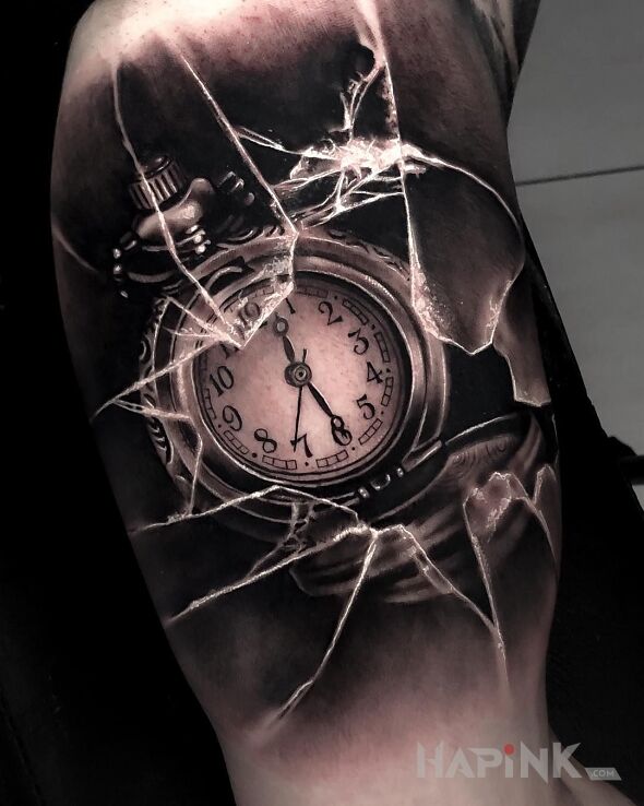 Tattoo Kieszonkowy zegarek in objects motif and realistic style on the upper arm