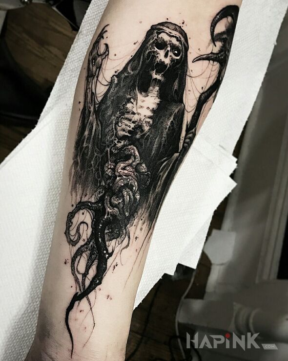 Tattoo Mroczny obrazek in dark motif and graphic / illustrative style on the forearm