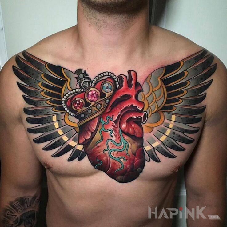 Tattoo Skrzydlate serce in black and gray motif and neo-traditional style on the chest