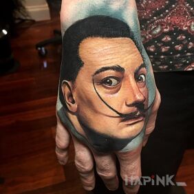 Tattoo Salvador dali on the hand motif: characters style: realistic