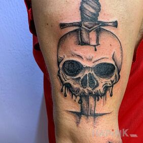 Tattoo Sword, skull on the upper arm motif: objects style: realistic