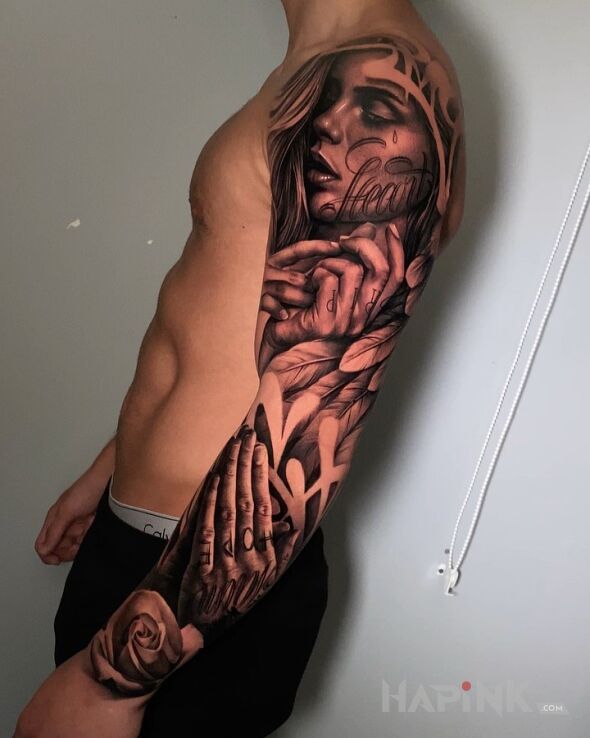 Tattoo Portret z dłońmi in black and gray motif and realistic style on the forearm