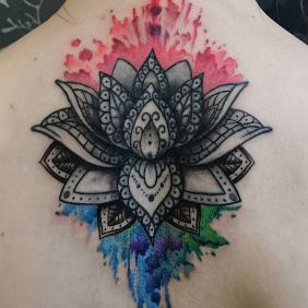 Tattoo Mandala watercolor on the back motif: flowers style: Watercolor